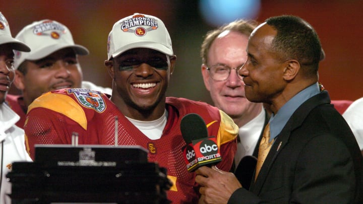 Jan 4, 2005; Miami Gardens, FL, USA; Southern California Trojans running back Reggie Bush is interviewed by ABC broadcaster Lynn Swann after 55-19 victory over Oklahoma in the FedEx Orange Bowl in the BCS National Championship. Mandatory Credit: Kirby Lee-USA TODAY Sports