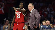 Dec 9, 2023; Tucson, Arizona, USA; Wisconsin Badgers guard John Blackwell (25) talks to Wisconsin Badgers head coach Greg Gard during the second half at McKale Center. Mandatory Credit: Zachary BonDurant-Imagn Images