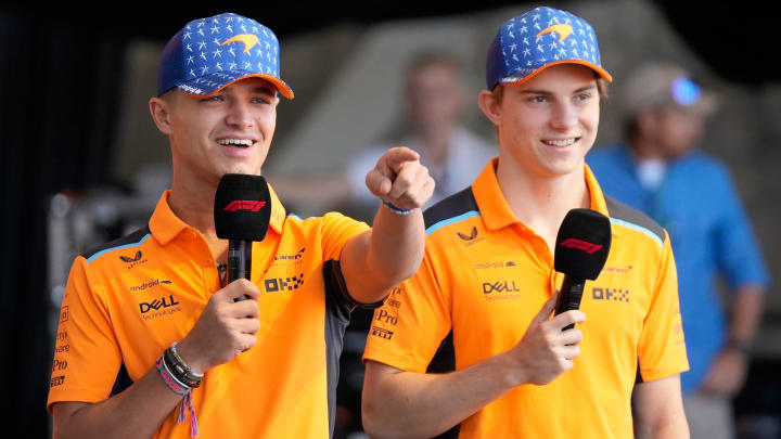 McLaren driver Lando Norris of United Kingdom, left, and McLaren driver Oscar Piastri of Australia, talk to fans at the Driver Engagement event at the Formula 1 Lenovo United States Grand Prix at Circuit of the Americas on Friday October 20, 2023.