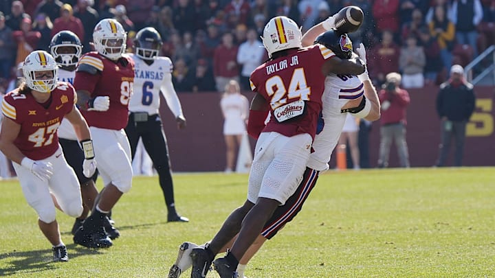 Iowa State Cyclones' defensive back Quentin Taylor Jr. (24) knocks out a pass from Kansas Jayhawks quarterback Isaiah Marshall (8) during the first quarter in the senior day on Nov. 22, 2025, at Jack Trice Stadium in Ames, Iowa