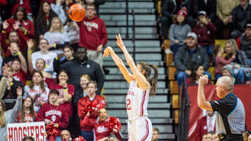Indiana's Yarden Garzon (12) shoots a three-pointer during the Indiana versus Ohio State womens basketball game at Simon Skjodt Assembly Hall on Thursday, Feb. 20, 2025.