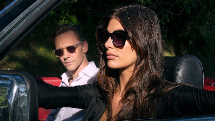 Tom Hiddleston as Jonathan Pine, Camila Morrone as Roxana - Credit: Des Willie/Prime 