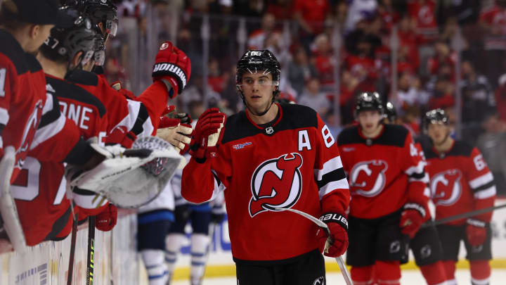 Mar 21, 2024; Newark, New Jersey, USA; New Jersey Devils center Jack Hughes (86) celebrates his goal against the Winnipeg Jets during the third period at Prudential Center. Mandatory Credit: Ed Mulholland-USA TODAY Sports