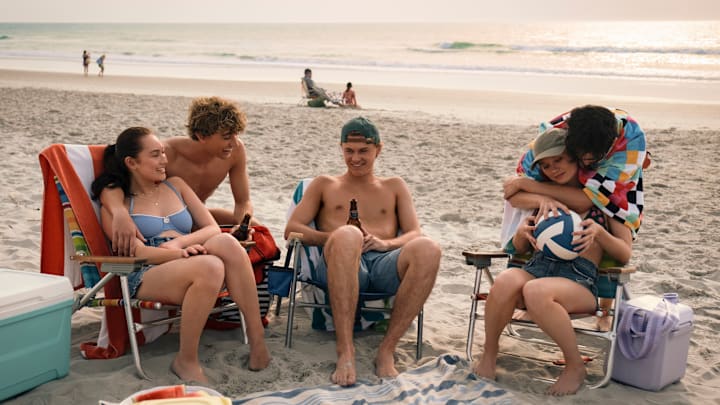 Belly (Lola Tung), Jeremiah (Gavin Casalegno), Conrad (Christopher Briney), Steven (Sean Kaufman), and Taylor (Rain Spencer) in THE SUMMER I TURNED PRETTY Photo: Erika Doss © AMAZON CONTENT SERVICES LLC