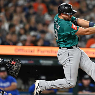 Cal Raleigh hit two balls out of the park against the Detroit Tigers Friday