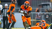 D'shaun Ford 22 runs the ball as the Opelousas High Tigers take on the Cecilia Bulldogs. Friday, Oct. 25, 2024.