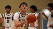 St. Michael's guard Bo Ogden (5) shoots a free throw during the game against LASA at St. Michael's Athletic Center on Friday, Dec. 20, 2024 in Austin.