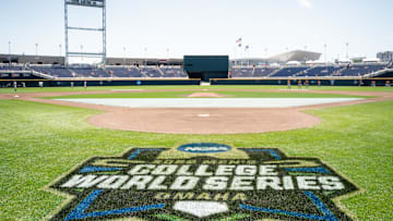 Jun 19, 2022; Omaha, NE, USA; The 2022 NCAA College World Series logo is pictured on the field before the game between the Texas Longhorns and the Texas A&M Aggies at Charles Schwab Field. Mandatory Credit: Dylan Widger-Imagn Images