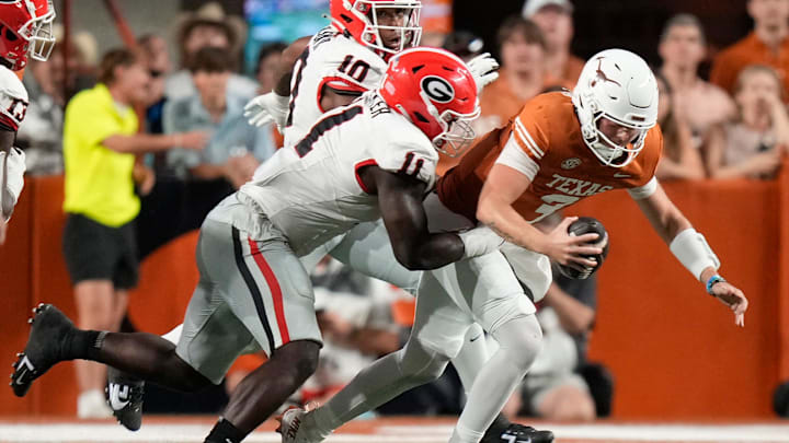 Georgia Bulldogs linebacker Jalon Walker sacks Texas Longhorns quarterback Quinn Ewers in the second quarter at Darrell K Royal-Texas Memorial Stadium Saturday October 19, 2024. Georgia Bulldogs linebacker Jalon Walker sacks Texas Longhorns quarterback Quinn Ewers in the second quarter at Darrell K Royal-Texas Memorial Stadium Saturday October 19, 2024.