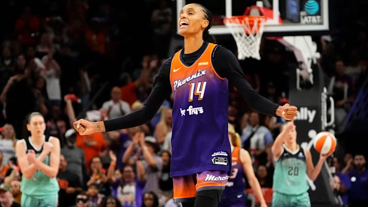 Phoenix Mercury forward DeWanna Bonner (14) reacts after making a jumper shot against the New York Liberty late in the fourth quarter during Game Three of the 2025 WNBA Playoffs first round at PHX Arena on Sept. 19, 2025, in Phoenix. Phoenix Mercury forward DeWanna Bonner (14) reacts after making a jumper shot against the New York Liberty late in the fourth quarter during Game Three of the 2025 WNBA Playoffs first round at PHX Arena on Sept. 19, 2025, in Phoenix.