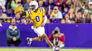 Zavion Thomas 0 runs the ball as the LSU Tigers take on the Vanderbilt Commodores. Nov 23, 2024; Baton Rouge, Louisiana, USA; at Tiger Stadium.