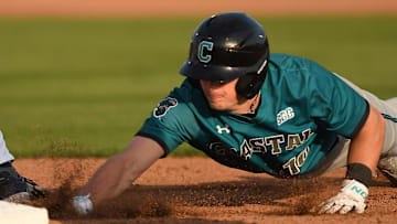 Coastal's #10 Sam Antonacci jumps back to 1st base as UNCW took on Coastal Carolina Tuesday April 2, 2024 at home. UNCW won 6-4. KEN BLEVINS/STARNEWS