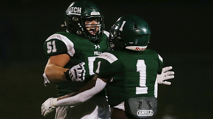 Pella's Emmanuel Diers (1) and Benjamin Dothager (51) celebrate earlier this season. The Dutch knocked off Lewis Central Thursday to advance to the Class 4A title game. Pella's Emmanuel Diers (1) and Benjamin Dothager (51) celebrate earlier this season. The Dutch knocked off Lewis Central Thursday to advance to the Class 4A title game.