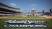Dodger Stadium's infield shows off a display honoring the 2025 World Series champions in Los Angeles on Monday, Nov. 3, 2025. The Dodgers beat the Toronto Blue Jays in seven games to win their second straight World Series title and third in last six years.