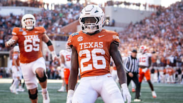 Dec 21, 2024; Austin, Texas, USA; Texas Longhorns running back Quintrevion Wisner (26) celebrates after scoring a touchdown in the second quarter against the Clemson Tigers at Darrell K Royal Texas Memorial Stadium. Mandatory Credit: Sara Diggins-Imagn Images