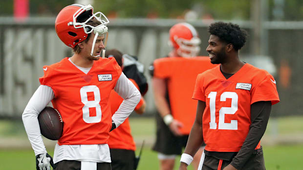 Cleveland Browns quarterback Kenny Pickett, left, chats with quarterback Shedeur Sanders (12) during an NFL practice at the C Cleveland Browns quarterback Kenny Pickett, left, chats with quarterback Shedeur Sanders (12) during an NFL practice at the C