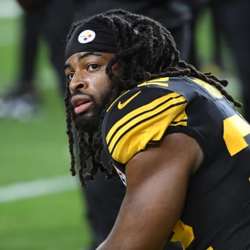 Dec 7, 2023; Pittsburgh, Pennsylvania, USA;  Pittsburgh Steelers running back Najee Harris (22) watches the field before playing the New England Patriots at Acrisure Stadium. Mandatory Credit: Philip G. Pavely-USA TODAY Sports