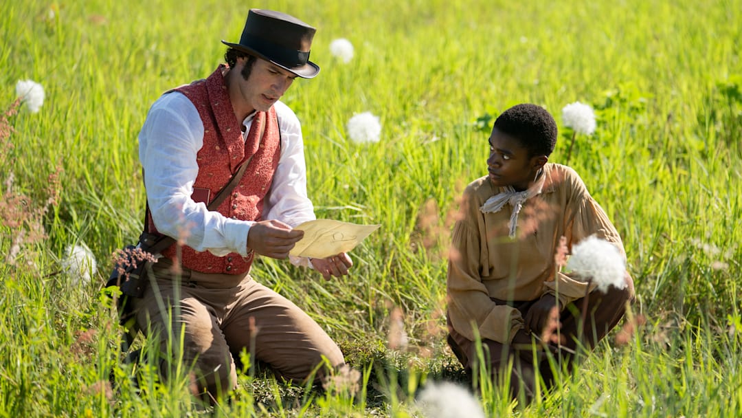 Tom Ellis as Christopher 'Titch' Wilde and Eddie Karanja as Young George 'Wash' Black in Washington Black