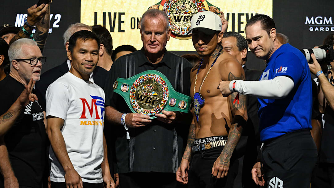 Manny Pacquiao (left) and Mario Barrios (right) at weigh ins ahead of their fight. Manny Pacquiao (left) and Mario Barrios (right) at weigh ins ahead of their fight.