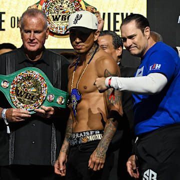 Manny Pacquiao (left) and Mario Barrios (right) at weigh ins ahead of their fight.