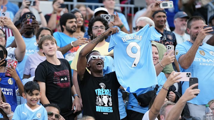 Manchester City fans cheer on Erling Haaland after his performance against Chelsea