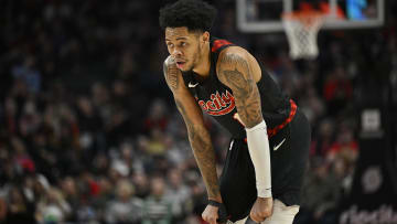 Feb 15, 2024; Portland, Oregon, USA; Portland Trail Blazers guard Anfernee Simons (1) watches during a break in the second half against the Minnesota Timberwolves at Moda Center. Mandatory Credit: Troy Wayrynen-USA TODAY Sports