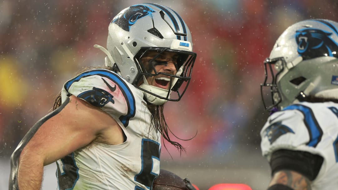Jan 3, 2026; Tampa, Florida, USA; Carolina Panthers linebacker Christian Rozeboom (56) celebrates intercepting the ball against the Tampa Bay Buccaneers in the first half at Raymond James Stadium.
