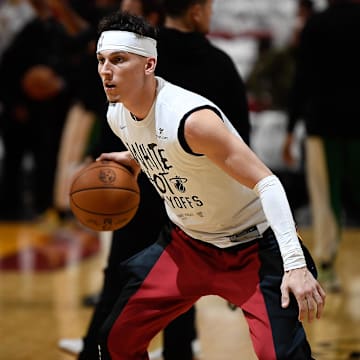 Apr 29, 2024; Miami, Florida, USA; Miami Heat guard Tyler Herro (14) warms up to play the Boston Celtics in game four of the first round for the 2024 NBA playoffs at Kaseya Center. Mandatory Credit: Michael Laughlin-Imagn Images