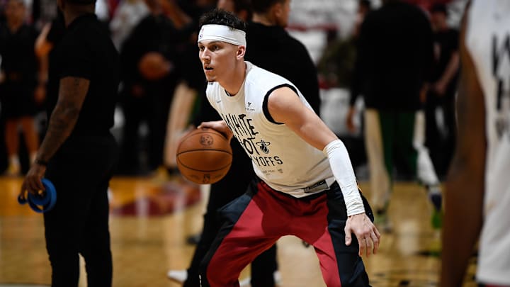 Apr 29, 2024; Miami, Florida, USA; Miami Heat guard Tyler Herro (14) warms up to play the Boston Celtics in game four of the first round for the 2024 NBA playoffs at Kaseya Center. Mandatory Credit: Michael Laughlin-Imagn Images