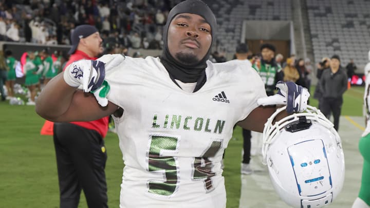 Lincoln's Eugene Rice celebrates after winning the 2022 San Diego Section Open Division championship