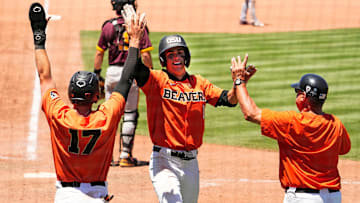 Oregon State's Gavin Turley (1) celebrates after hitting a 3-run inside-the-park home run against Arizona State in the ninth inning during the Pac-12 Tournament at Scottsdale Stadium on May 25, 2023.