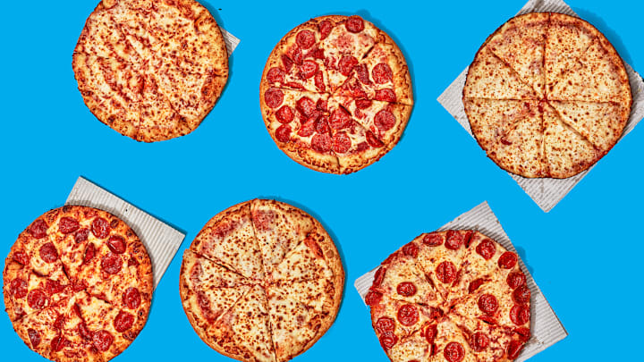 Pizza pies on a blue background