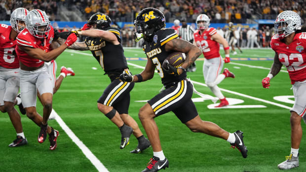 Luther Burden III makes a catch and gets up field in Missouri's win over Ohio State