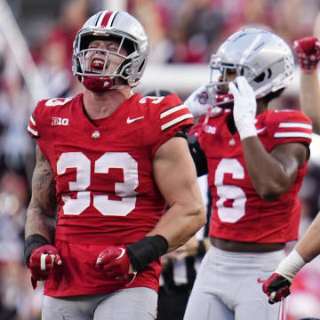 Sep 16, 2023; Columbus, Ohio, USA; Ohio State Buckeyes defensive end Jack Sawyer (33) lets out a yell during the NCAA football game against the Western Kentucky Hilltoppers at Ohio Stadium. Ohio State won 63-10.