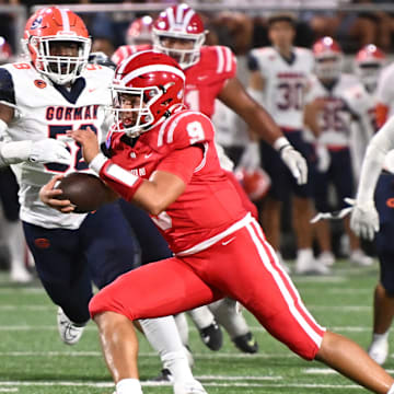 Mater Dei QB Ashton Beierly scrambles in the first half against Bishop Gorman on Friday, Sept. 6, 2024.