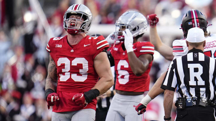 Sep 16, 2023; Columbus, Ohio, USA; Ohio State Buckeyes defensive end Jack Sawyer (33) lets out a yell during the NCAA football game against the Western Kentucky Hilltoppers at Ohio Stadium. Ohio State won 63-10.