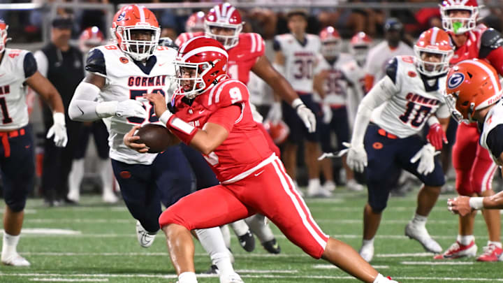 Mater Dei QB Ashton Beierly scrambles in the first half against Bishop Gorman on Friday, Sept. 6, 2024.