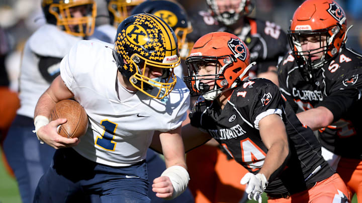 Kirtland quarterback Jake LaVerde takes the ball in for a second half against Coldwater in OHSAA Division VI state final at Tom Benson Hall of Fame Stadium. Saturday, Dec. 7, 2024