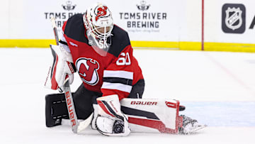 Sep 30, 2024; Newark, New Jersey, USA; New Jersey Devils goaltender Jeremy Brodeur (60) makes a save against the New York Rangers during the third period at Prudential Center. Mandatory Credit: Ed Mulholland-Imagn Images