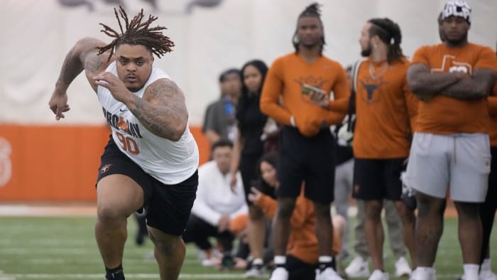 Defensive lineman Byron Murphy runs through drills at Texas Longhorns Football Pro Day at Frank