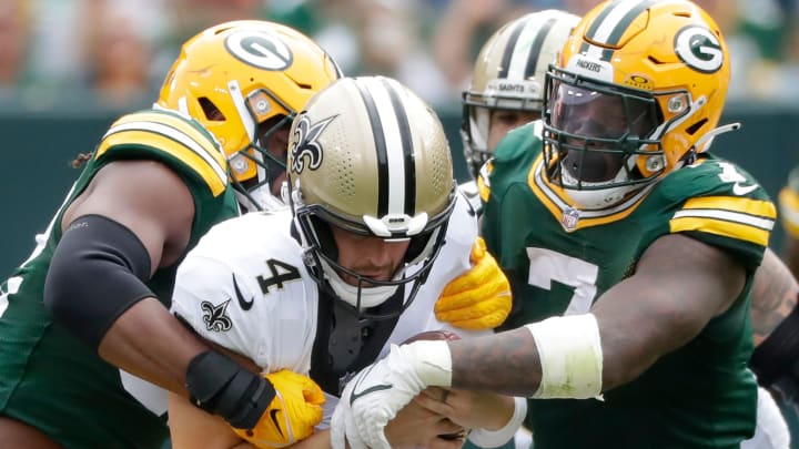 New Orleans Saints quarterback Derek Carr (4) sacked against the Green Bay Packers 