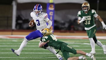 St. Bonaventure's Dylan Dunst tackles Folsom quarterback Ryder Lyons during the fourth quarter of the CIF-State Division 1-A state championship bowl at Saddleback College in Mission Viejo on Saturday, Dec. 9, 2023. St. Bonaventure lost 20-14.