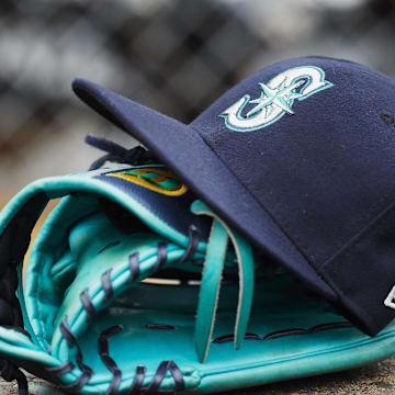 May 12, 2018; Detroit, MI, USA; Hat and glove of Seattle Mariners center fielder Dee Gordon (9) sits in dugout during the third inning against the Detroit Tigers at Comerica Park. Mandatory Credit: Rick Osentoski-Imagn Images