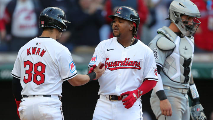 Cleveland Guardians third baseman Jose Ramirez (11) celebrates with Cleveland Guardians outfielder Steven Kwan (38) at home after his two-run homer during the fifth inning of the Cleveland Guardians' home opener against the Chicago White Sox, Monday, April 8, 2024, in Cleveland, Ohio.