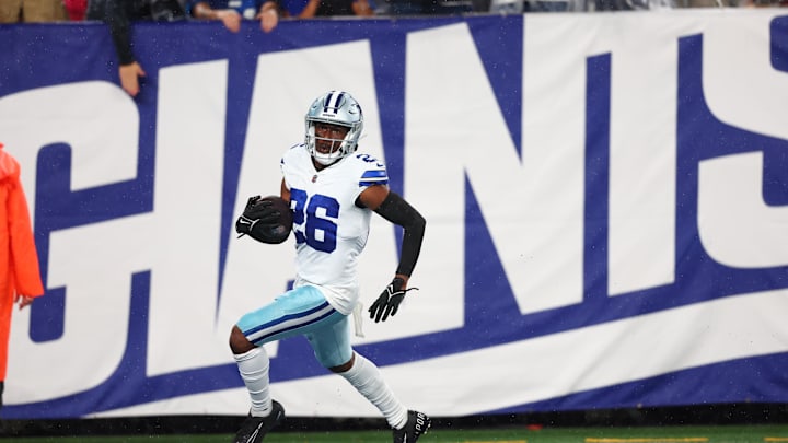 Dallas Cowboys CB DaRon Bland returns an interception for a TD against the New York Giants at MetLife Stadium. Dallas Cowboys CB DaRon Bland returns an interception for a TD against the New York Giants at MetLife Stadium.