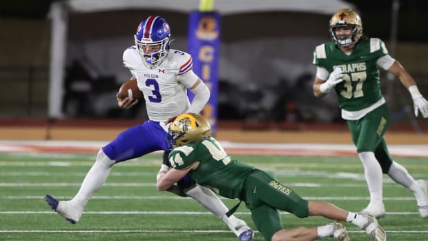 St. Bonaventure's Dylan Dunst tackles Folsom quarterback Ryder Lyons during the fourth quarter of the CIF-State Division 1-A 