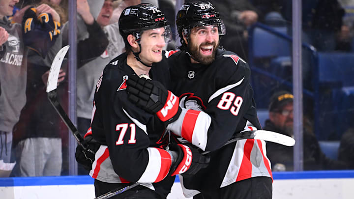 Buffalo Sabres forwards Ryan McLeod and Alex Tuch