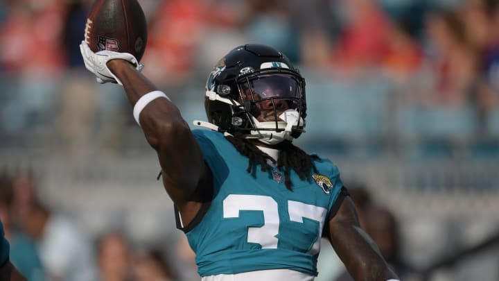 Jacksonville Jaguars cornerback Tre Flowers (37) throws the ball to fans in the stands as he warmed up ahead of the start of Saturday's game against the Chiefs. The Jaguars led 20 to 10 at the end of the first half. The Jacksonville Jaguars hosted the Kansas City Chiefs in the Jaguars first preseason game of the season Saturday, August10, 2024 at EverBank Stadium in Jacksonville, Fla. [Bob Self/Florida Times-Union]