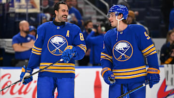 Buffalo Sabres forwards Alex Tuch and Josh Doan