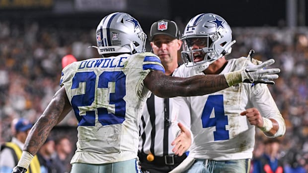Dallas Cowboys running back Rico Dowdle and quarterback Dak Prescott